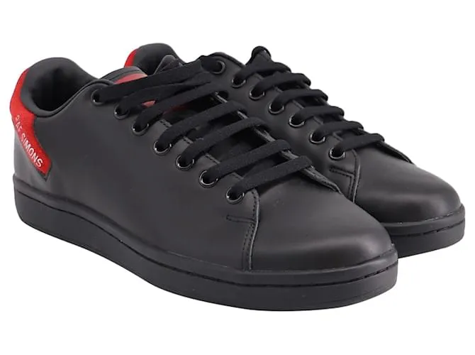 Raf Simons Low Top Sneakers en Cuero Negro 