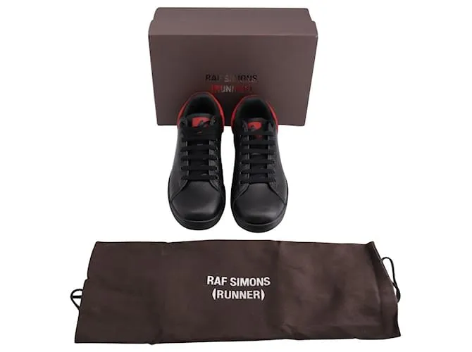 Raf Simons Low Top Sneakers en Cuero Negro 